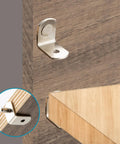 Close-up of Heavy Duty 3/16 Inch Shelf Pins For Cabinets, Right Angle Metal Pegs supporting a wooden shelf in cabinetry.
