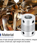 5Mm To 10Mm Aluminum Beefy Shaft Coupling Flexible Coupler material close-up in a pile of metal, highlighting durability and material.