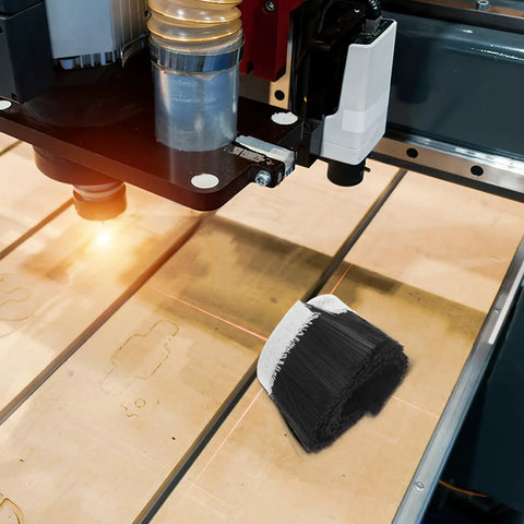 Boss Level Cnc Vacuum Dust Brush helps kick sawdust and chunky wood chips from router spindle on CNC table.
