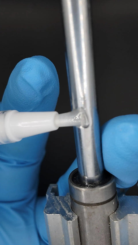 Twist To Dispense Precision Oil Applicator With Food Grade Synthetic Lubricant For 3D Printers CNC Laser Engravers Sewing Machines Keeps Bearings Rails And Motion Systems Running Smoothly lubricating a metal rod