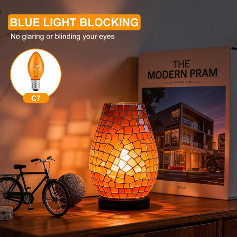 LED Night Light Bulbs 1W E12 C7 Replacement 2200K Warm Amber 120V displayed beside lit salt lamp on wooden desk