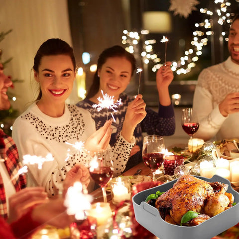 Air Fryer Silicone Pot Set For 8 Qt Dual DZ201 DZ401 with roast chicken at festive dinner table, reusable liners and gloves visible