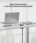 Top Shelf Three Inch Flush Mount Desktop Power Grommet With Two AC Outlets And Four Usb Ports Featuring PD 20W Fast Charge Plus A Six Foot Cord To Keep Your Desk Setup Slick And Totally Hassle Free, installed in a sleek white desk.