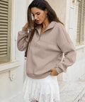 Woman in Cozy Oversized Women Quarter Zip Fleece Sweatshirt With Half Zip Collared Long Sleeve Pullover For Fall And Winter Soft Cotton Polyester Blend Coffee Gray Laid Back Yet Polished Everyday Warmth And Comfort, standing outdoors.