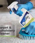 Person using Fast Acting Carpet And Upholstery Stain Remover Spray For Rugs Couches And Car Seats That Quickly Erases Grease Coffee Wine