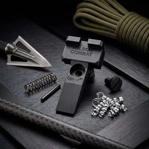 Beefed Up Battlesight Rear Sight for Colt Python Anaconda with serrated blade, spring, and screws displayed on black surface.