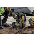 Worker using Dual Port Charger For ToughSystem 2.0 20V Max Batteries With Dual USB Ports And IP55 Dust And Water Protection on site.