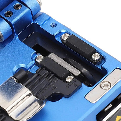 Close-up of Aramox Pro Optical Fiber Cleaver High Precision Cutter showing tungsten steel blade and aluminum alloy structure.
