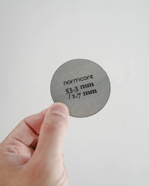 Espresso Puck Screen For 54mm Portafilter Lower Shower Screen 53.3mm Fit 316 Stainless Steel held in hand