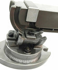 Heavy Duty Swivel Milling Vise With Smooth Angle Tilt Setup And Beefy Two Inch Jaw Precision Clamp close-up of rotating base and tilt mechanism.
