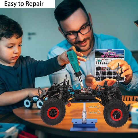 Father and son using Pro RC Repair Stand Kit With 532 Piece Screw Set And 360 Degree Rotating Work Station for RC truck maintenance.