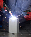 Person welding on a metal coupon from the 48 Piece Welding Practice Kit With Magnets For Beginners For MIG TIG ARC Gas And Brazing Training