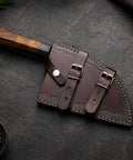 Damascus Steel Chef Knife With 7 Inch Blade And Full Tang A Beast Of A Meat Cutting Knife displayed in leather sheath.
