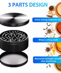 3 Inch Manual Spice Grinder For Kitchen With 3 Piece Design No Mesh Screen Durable Zinc Alloy Construction Sharp Teeth For Consistent Grinding Grinds Like A Boss Compact Easy To Clean Black showing three parts with spices.