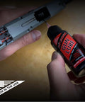 Applying All-Conditions Synthetic Gun Lube CLP for Rifles Pistols Shotguns, 16-Ounce Trigger Spray to firearm components