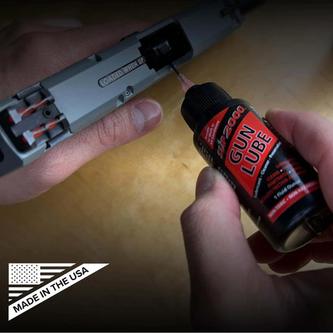 Applying All-Conditions Synthetic Gun Lube CLP for Rifles Pistols Shotguns, 16-Ounce Trigger Spray to firearm components