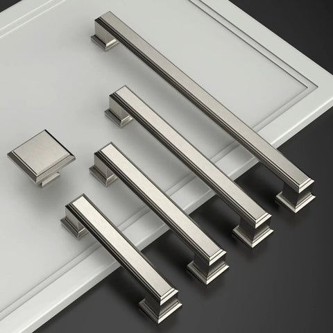 10 Pack Brushed Satin Nickel Cabinet Pulls 3-3/4 Inch Hole Center Kitchen Cabinet Hardware Handles arranged on a countertop