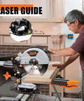 DWT sliding compound miter saw on a stand with a 10-inch blade, laser guide, orange clamp, cutting wood.