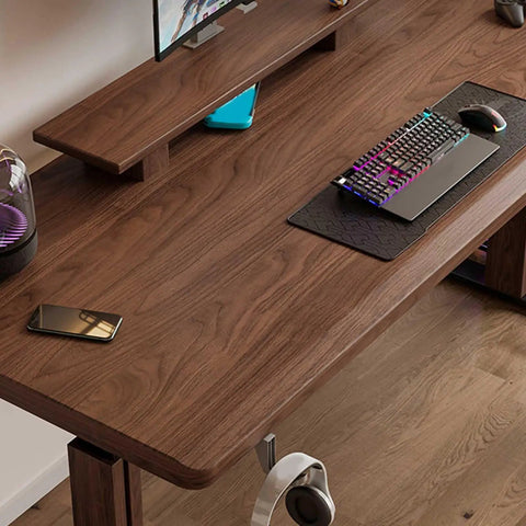 Straight Up Solid Wood Electric Standing Desk With Drawers, Adjustable Height Workbench For Home Office And Gaming Setup, Reliable Motorized Lift Table Built To Last, wooden surface with keyboard and monitor stand.