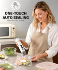 Woman using Cordless Handheld Food Vacuum Sealer With 30 Reusable Bags, Compact Portable Saver for Sous Vide, Meal Prep