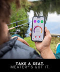 Person using app for 100 Percent Wireless Smart Meat Thermometer With Dual Temp Sensors And Guided Cook System outdoors