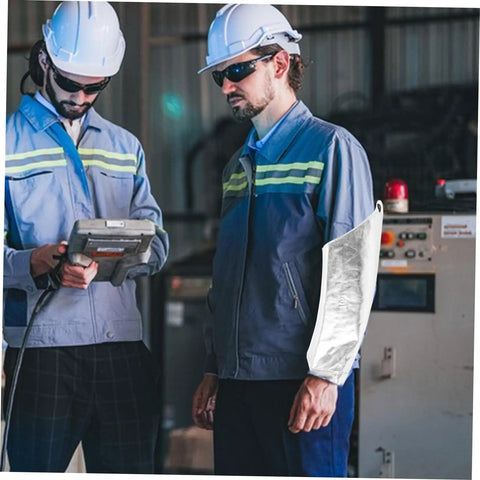 Badass Flame Resistant Heat Shield Arm Sleeves For Mechanics Tough As Nails Flexible Aluminum Foil worn by worker with equipment.