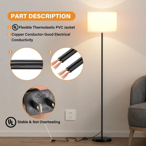 Black floor lamp with a white drum shade, 60-inch tall, on a wooden floor with visible power cord.