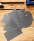 Tough As Nails Steel Cabinet Scraper Tool Kit With Two Precision Card Scrapers For Woodworking, showing five steel scrapers on wooden surface.