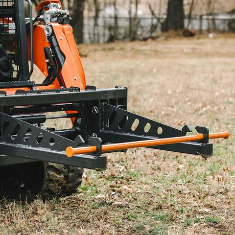 Skid Steer Sod Roller with Adjustable 36in 44in 52in Widths, Universal Quick Tach, shown attached to skid steer in grassy field