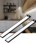 LED Motion Sensor Under Cabinet Lights 2 Pack With Ultra Thin Magnetic Closet Design 69 LEDs Wireless Battery Operated 2200mAh Rechargeable Power Magnetic Kitchen Counter Lights Black shown installed under kitchen cabinets
