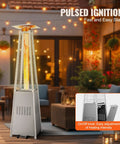 Pyramid Propane Patio Heater With Wheels 48000 BTU Outdoor Heater With Quartz Glass Tube in a cozy garden setting at night.