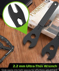2.2 mm ultra-thin black wrenches on table from Five Piece Bike Cone Wrench Set 13, 14, 15, 16, 17 Mm Slim Open End Spanners