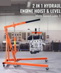 Heavy Duty Hydraulic Engine Hoist And Two Ton 4400 Lbs Cherry Picker Shop Crane lifting a car engine in a garage setting.