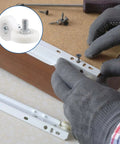Person installing Pack Of Twelve 1 Inch Drawer Slide Roller Wheels Slick Gliding Pom Nylon Construction with stainless steel threads.