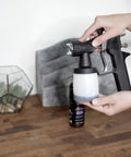 Replacement Gun For HVLP Spray Tan Machine With 200ml Cup And Adjustable Flow showcased on wooden table.
