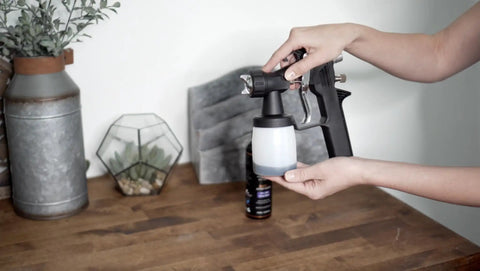 Replacement Gun For HVLP Spray Tan Machine With 200ml Cup And Adjustable Flow showcased on wooden table.