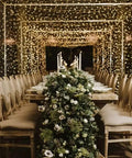 Extra Long 181 Foot 500 LED Christmas String Lights Indoor Outdoor With Clear Wire Warm White 8 Modes Plug In Fairy Lights decorating a dining area.