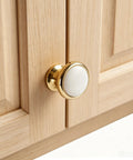 Slick Vintage White Ceramic Cabinet Knob Set Four Piece Single Hole Drawer Pulls Premium Zinc Alloy Base on wooden cabinet