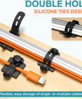 Cable Management Kit With 15 Adhesive Cable Holders 15 Zip Ties 15 Screws 8 Silicone Cord Ties And 8 Adjustable Straps shown on desk