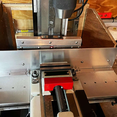 Machine setup with Six Pack 5052 Aluminum Sheet Metal 12x12 Inch Flat Plate 0.02 Inch Thick With Protective Film for DIY Crafts