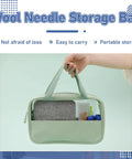 Person holding wool needle storage bag with felting kit for DIYers and crafters includes 6x6 felt pad and assorted needles