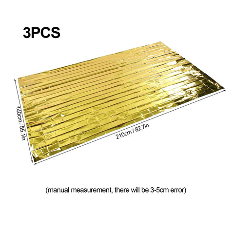 Three Pack Reflective Thermal Emergency Blankets For Survival Gear And Camping Space Blankets For Warmth And Protection 140x210 Cm Size Ideal For Sleeping Bags First Aid Kits Outdoor Prep And Homeless Care Packages. Image of a golden reflective blanket with dimensions 140x210 cm.