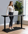 Person standing on Comfy Cushioned Anti Fatigue Kitchen Mat For Standing Long Shifts Water Resistant Non Slip Floor Rug Desk Mat Perfect For Kitchen Sink Office Laundry 17.3 By 28 Inches in office