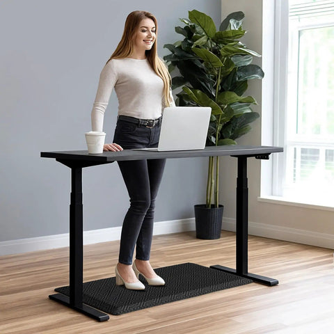 Person standing on Comfy Cushioned Anti Fatigue Kitchen Mat For Standing Long Shifts Water Resistant Non Slip Floor Rug Desk Mat Perfect For Kitchen Sink Office Laundry 17.3 By 28 Inches in office