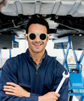 Built Tough Welding Glasses And Protective Goggles For Industrial Grinding, Super Comfy Ergonomic Fit, Straight Up 5 Pack Eye Safety Gear That Takes Zero Hustle To Handle Daily Jobs worn by a smiling mechanic.