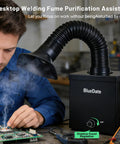 Man using DC Brushless Solder Fume Extractor with Strong Suction, Low Noise, H13 HEPA Filter for safe smoke removal during soldering.