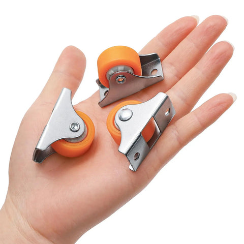 24 Pack 1 Inch Rigid Casters With Sturdy Metal Top Plate Low Profile Fixed Wheels For Furniture And Cabinet Parts Smooth Rolling Mount Kit Included In Bold Orange Finish shown on hand.