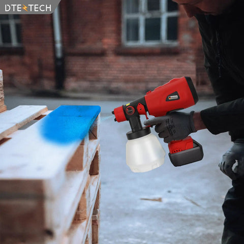 Cordless HVLP Paint Sprayer For Milwaukee 18v Battery Tool Only, 200w Brushless Motor handheld spray gun in action on blue wood.
