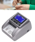 Super Fast Bill Counting Machine For US Dollars With Counterfeit Detection And Smart Value Tracker showing user counting cash.