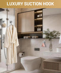 Luxury bathroom scene featuring Heavy Duty Suction Cup Hooks For Bathroom No Drill Towel And Robe Holder holding a robe.